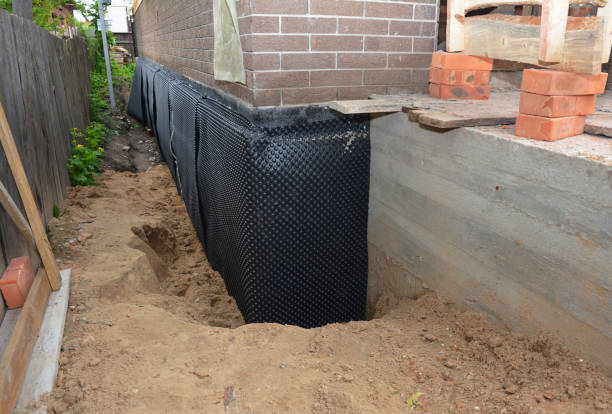 Happy homeowners after waterproofing job in Sinking Spring